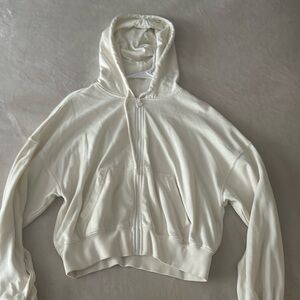 Cream cropped Fabletics sweater jacket